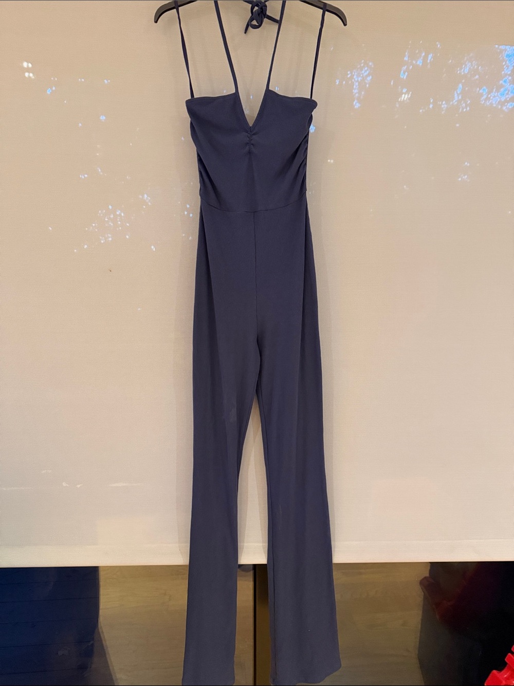 Young woman’s Classic Blue Halter Jumpsuit with Spaghetti Straps